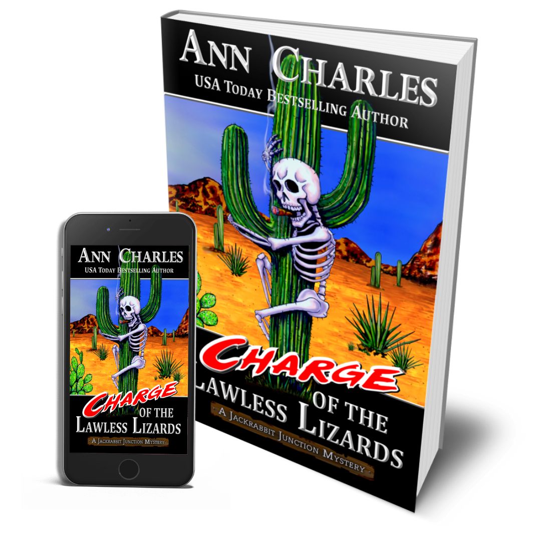 Book and phone display Ann Charles Store’s Book 7, Charge of the Lawless Lizards—skeleton on a desert cactus.